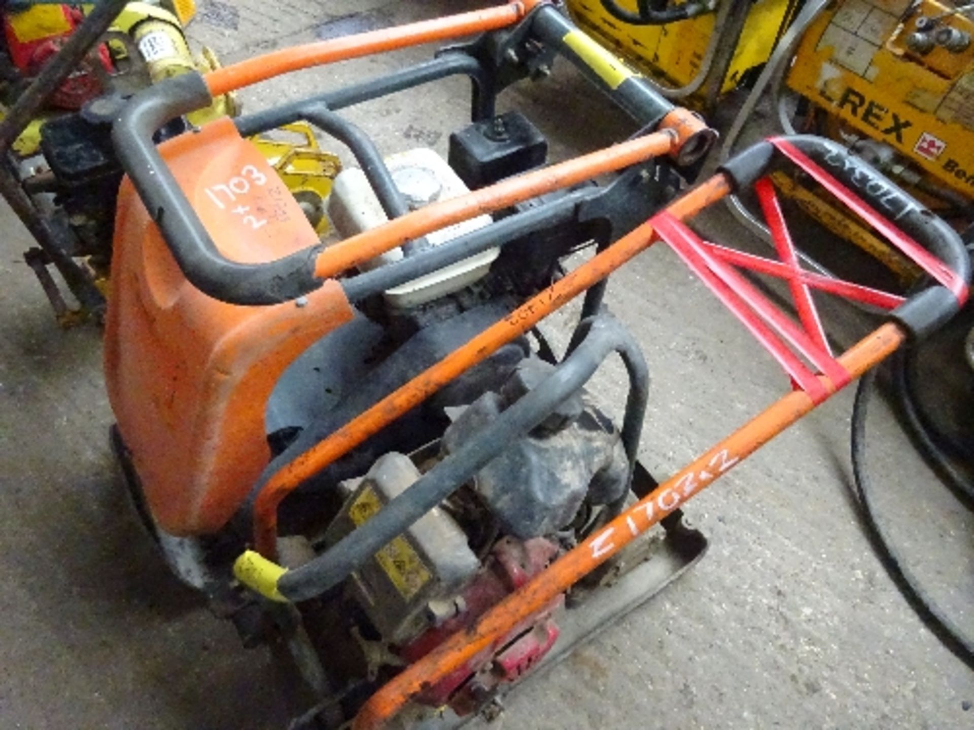 1 medium and 1 light petrol plate compactor