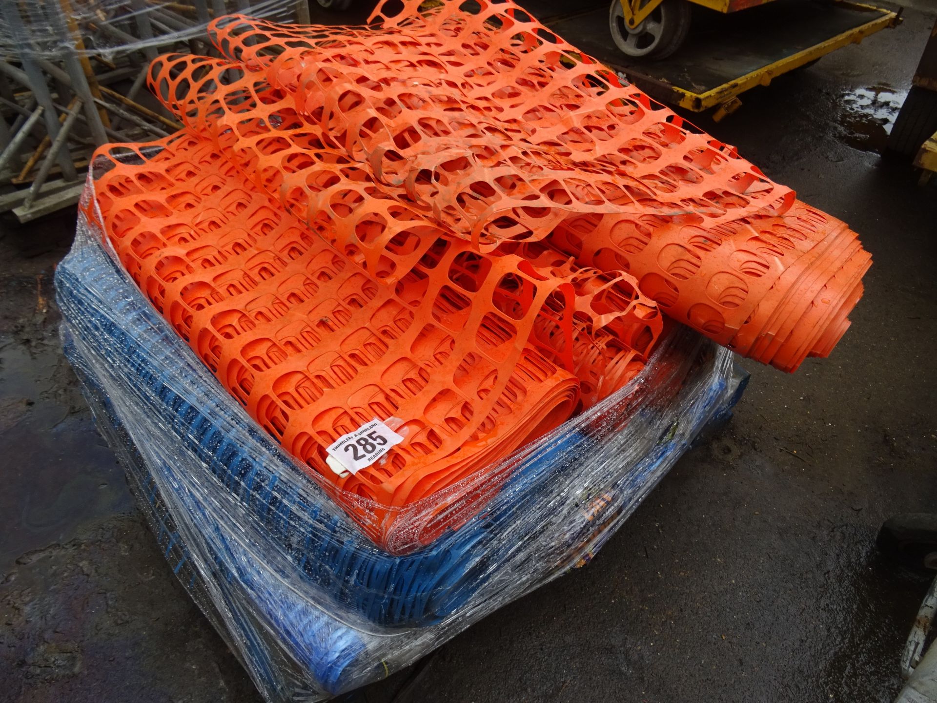 Pallet of blue and orange plastic netting