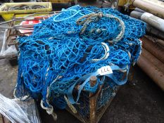 Stillage of blue safety netting