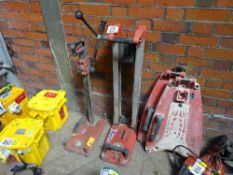 2 Hilti drill stands and 2 feet