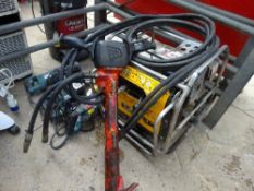 JCB hydraulic pack with hose and gun