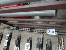 Assorted drill bits and chisels