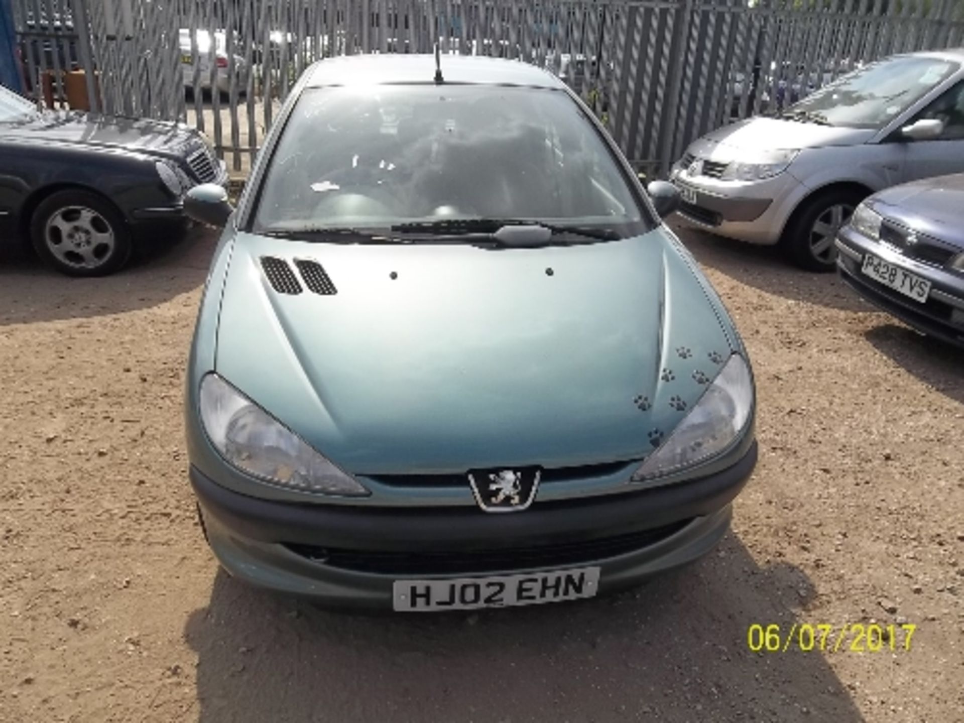 Peugeot 206 LX - HJ02 EHN Date of registration: 26.04.2002 1360cc, petrol, 4 speed auto, green