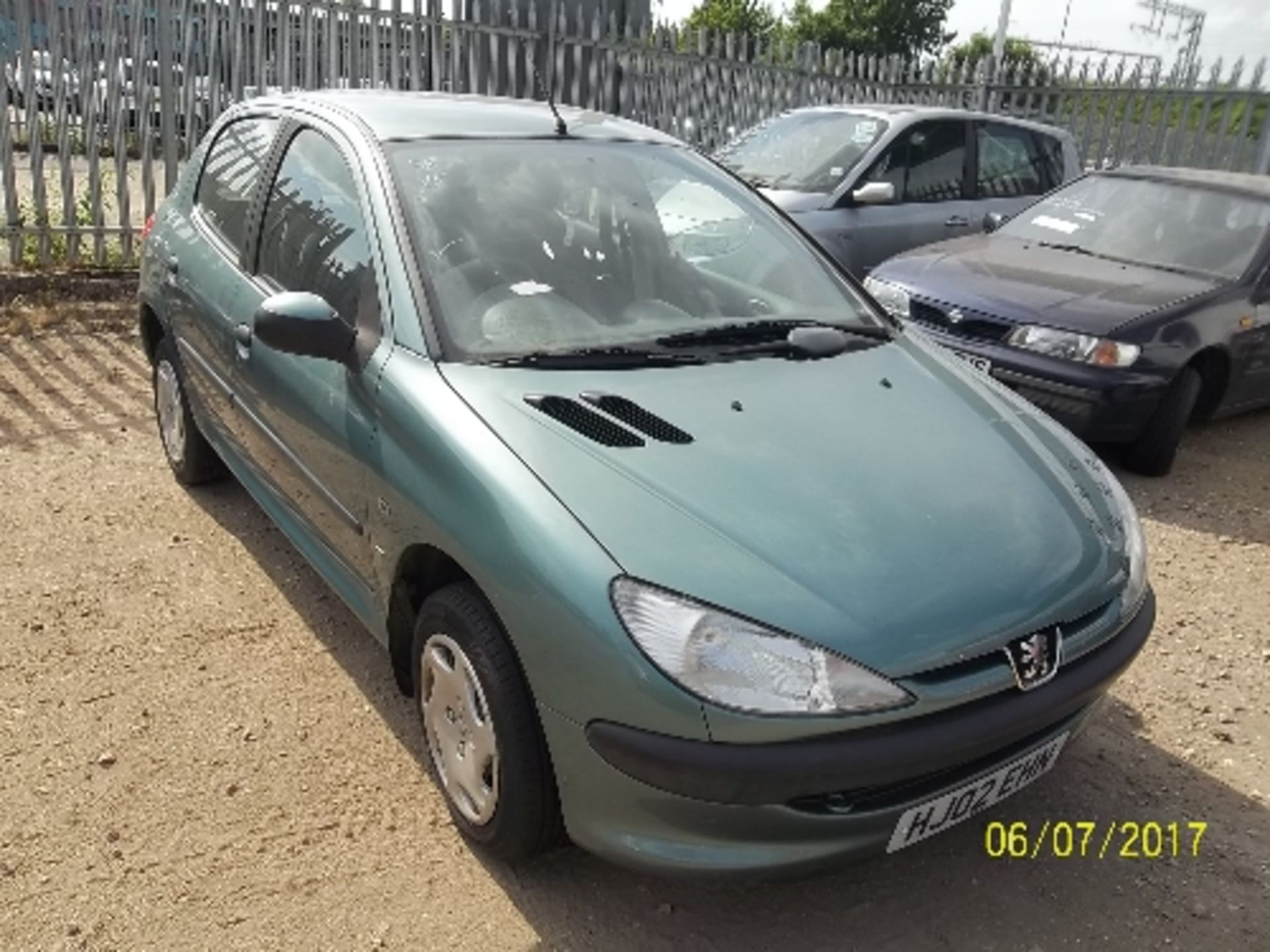 Peugeot 206 LX - HJ02 EHN Date of registration: 26.04.2002 1360cc, petrol, 4 speed auto, green - Image 2 of 4