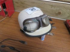 Stadium Clipper crash helmet and a pair of aviator goggles