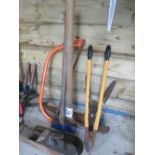 Assorted hand tools, pick axe, sledge hammer, bow saw etc