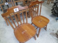 2 pine stick back dining chairs