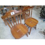2 pine stick back dining chairs