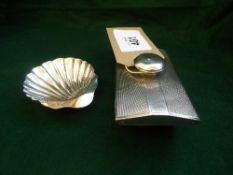 Hallmarked hammered silver mounted ink blotter, Birmingham, 1953 & a hallmarked silver shell-