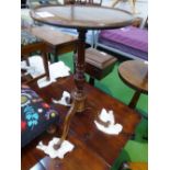 Mahogany pedestal wine table with turned column & scrolled supports, 14' diameter