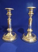 A pair of silver plated extendable candlesticks, height approx. 21cms