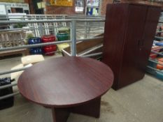 Suite of office furniture comprising circular table, tall 2 door cabinet, desk, low filing cabinet &