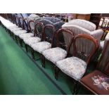 8 mahogany framed balloon-back dining chairs with upholstered seats