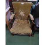 Victorian mahogany framed armchair in green coloured upholstery