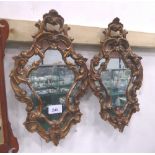 Pair of carved gilt wood, open scrolled work ornate wall mirrors, overall 25' x 15'