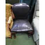 Dark green leather chair with carved cabriole legs & ball & claw feet