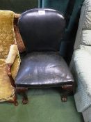 Dark green leather chair with carved cabriole legs & ball & claw feet