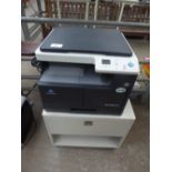 Konica Minolta Biz Hub 164 photocopier, on cabinet