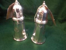 Pair of silver plated sugar casters, each with the RAF crest. Height 16.5cms