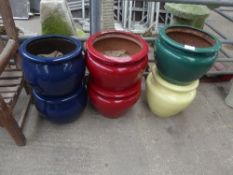 6 plastic coloured garden planters