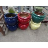 6 plastic coloured garden planters