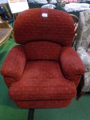 Rust pattern upholstered reclining armchair