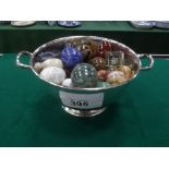 Silver plated 2 handled bowl, 7.75' diameter filled with polished stone eggs, marbles etc