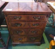 Walnut veneer batchelor's chest with fold-over top to lopPers & 4 graduated drawers, on bracket