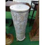 Composite plinth with Egyptian decoration on brass base, 30' high
