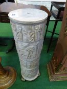 Composite plinth with Egyptian decoration on brass base, 30' high