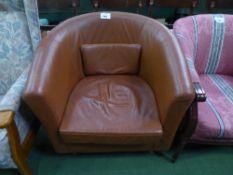 Brown leather type tub chair