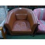 Brown leather type tub chair