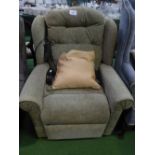 Green coloured upholstered electric reclining chair
