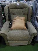 Green coloured upholstered electric reclining chair