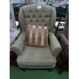 Button back upholstered armchair