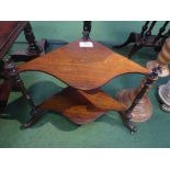 Rosewood serpentine shaped 2 tier wot-not on 3 castors