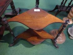 Rosewood serpentine shaped 2 tier wot-not on 3 castors