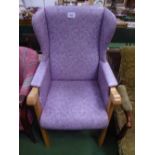 Purple coloured beech framed wing back armchair