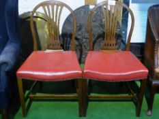 Pair of mahogany framed arch back dining chairs with leather-effect seats
