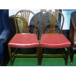 Pair of mahogany framed arch back dining chairs with leather-effect seats