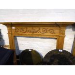 Pine hand-carved fire surround, opening 39' high x 42.5', overall 52' high x 63'