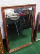 Gilt framed bevel edge wall mirror with decorative inset, 39' x 27'