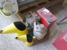 2 gallon petrol can, 2 paraffin cans, 2 oil jugs