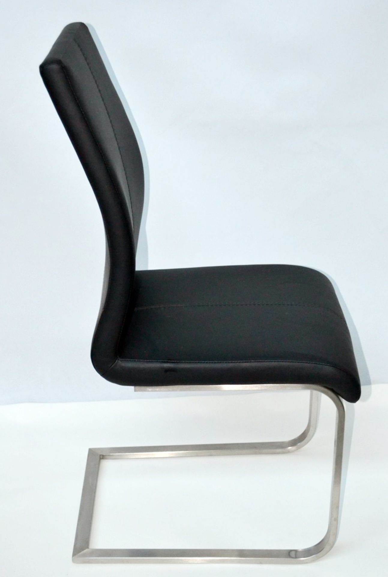 4 x Black Soft Leather Dining Chairs - Featuring A Curved Ergonomic Design With Metal Cantilever Bas