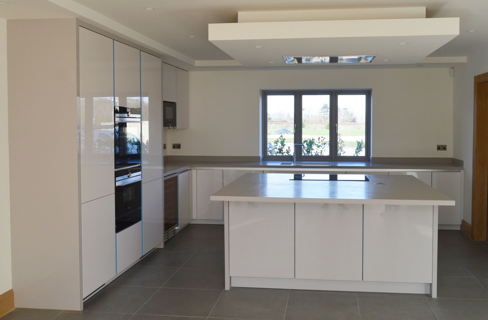 1 x Stunning KELLER Handleless FITTED KITCHEN With Corian Clay Worktops, Centre Island With - Image 2 of 104