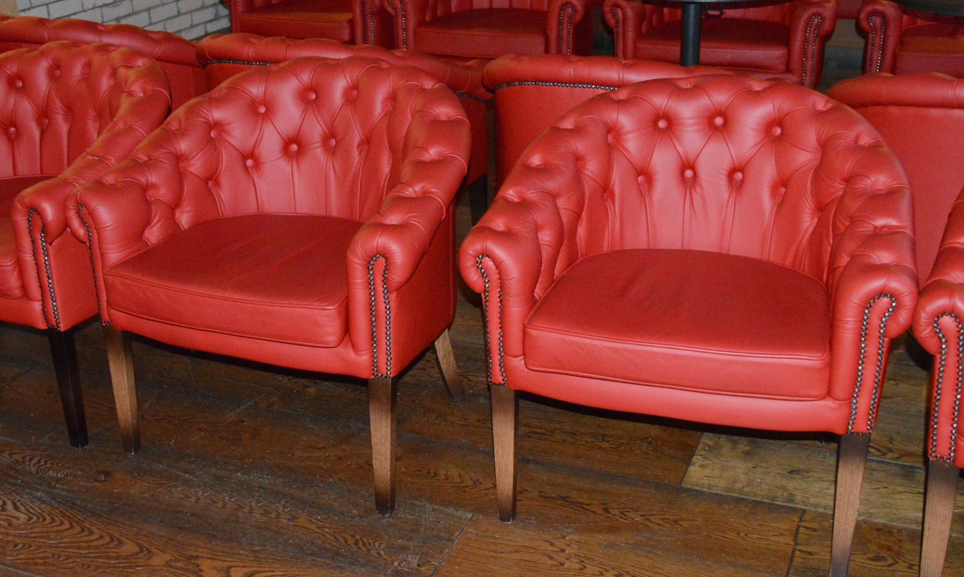 2 x Chesterfield Style Buttoned Back Red Leather Tub Chairs With Hardwood Legs Finished in an