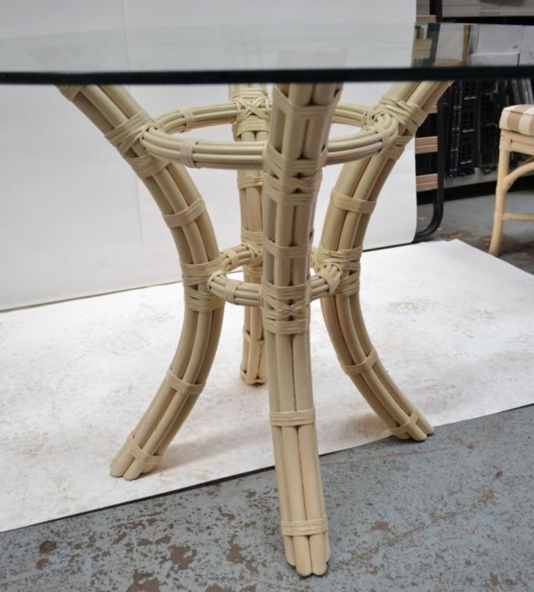 Glass Topped Cane Table with 4 Chairs - Pre-owned In Good Condition - AE010 - CL007 - Location: Altr - Image 8 of 13