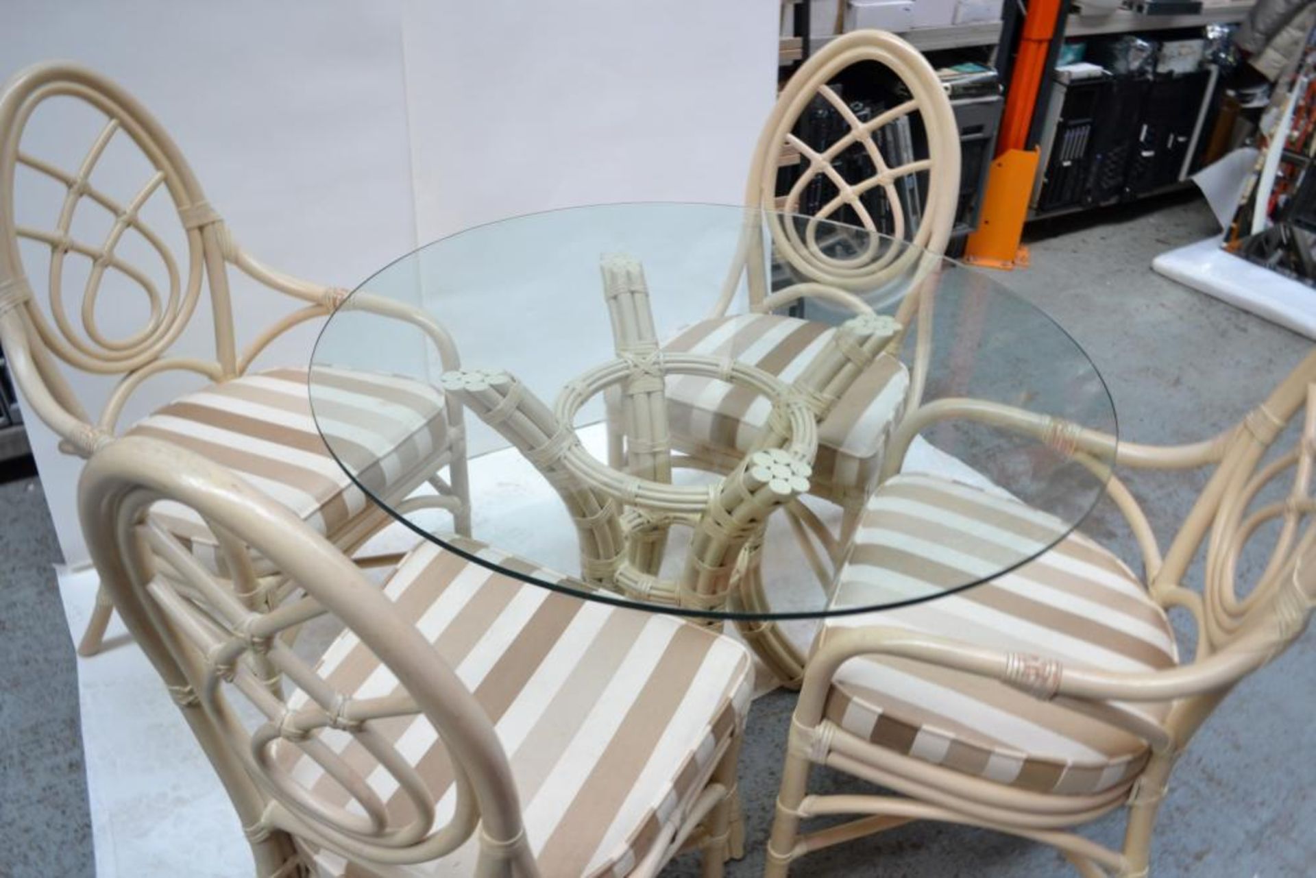 Glass Topped Cane Table with 4 Chairs - Pre-owned In Good Condition - AE010 - CL007 - Location: Altr - Image 4 of 13
