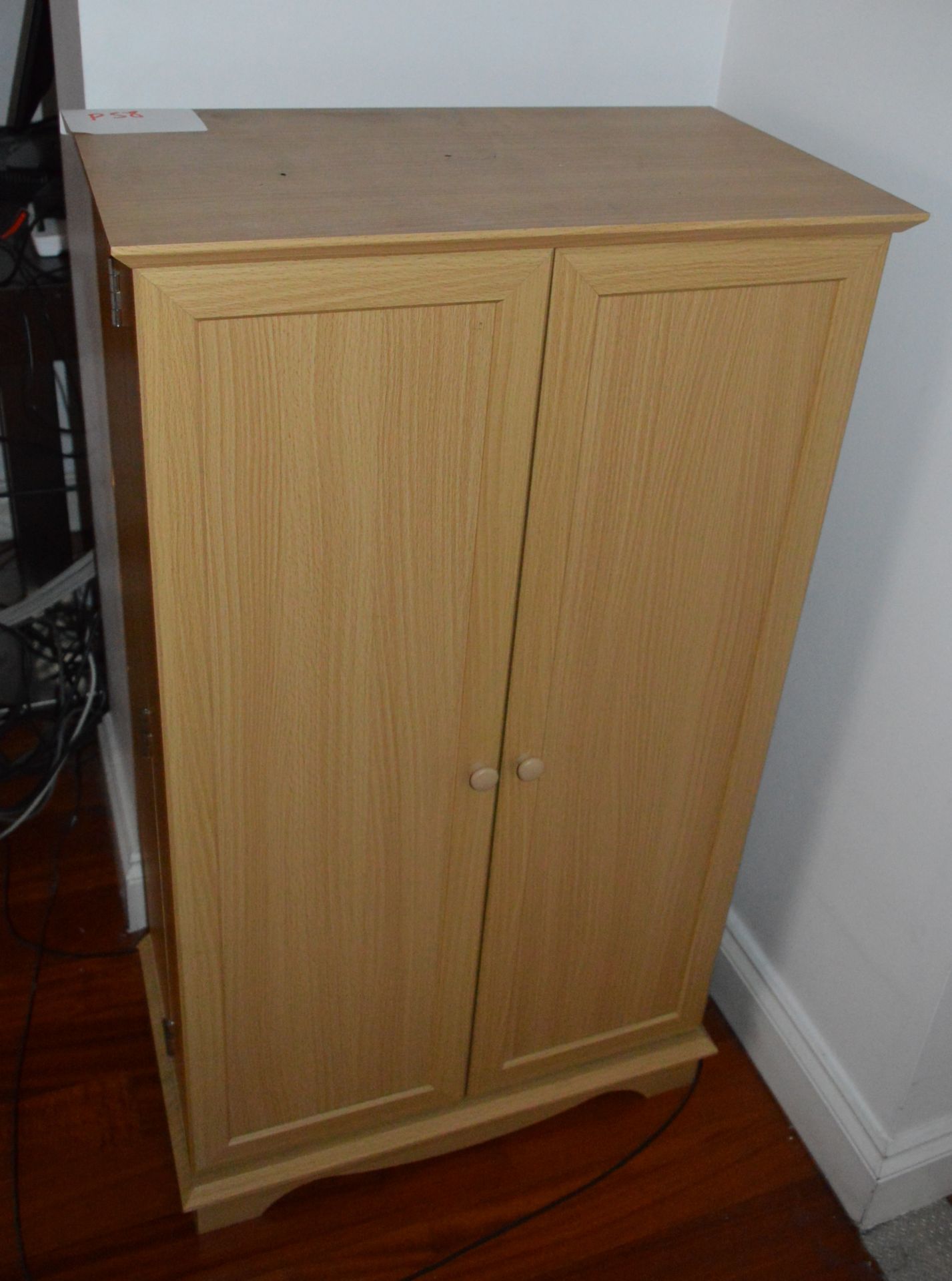 1 x Oak Two Door DVD / CD Cabinet - H118 x W61 x D34 cms - Good Condition - CL188 - Location: