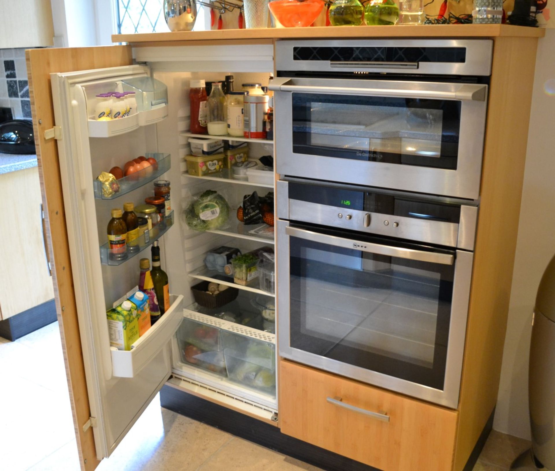 1 x Contemporary Beech Fitted Kitchen Featuring Corian Worktops And Integrated Appliances From Neff, - Image 10 of 19